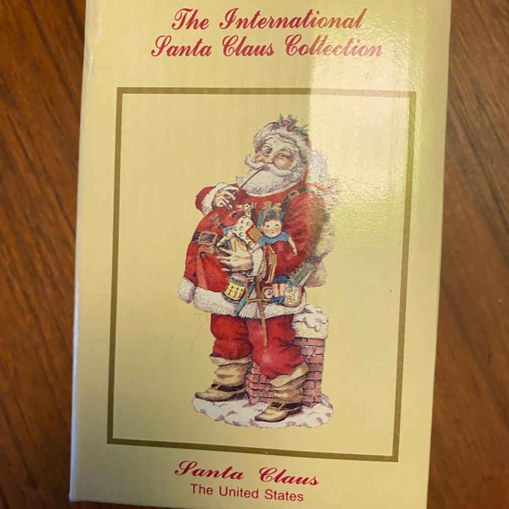 Lot of 10 new in box International Santa Claus Collection figurines